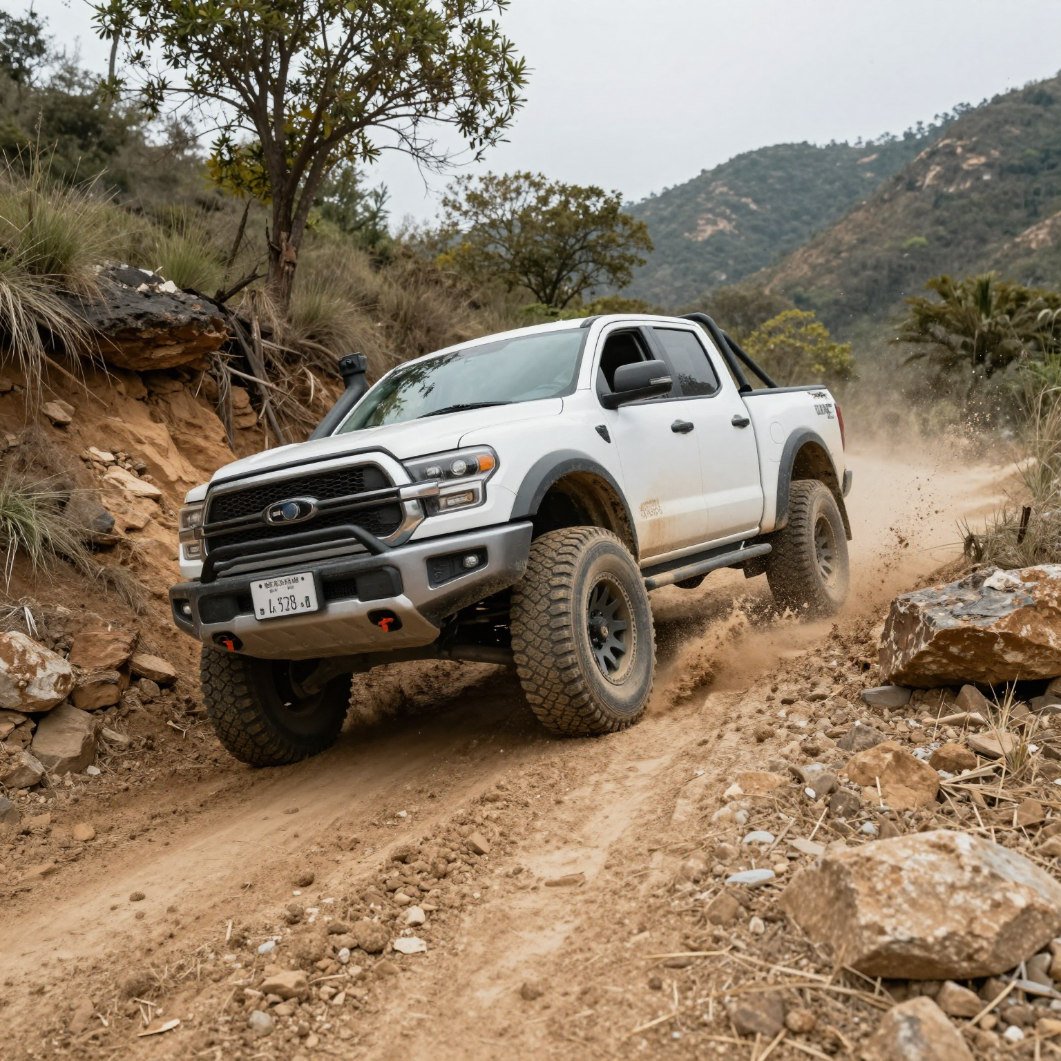 A rugged truck off-roading through mud in a wild landscape.