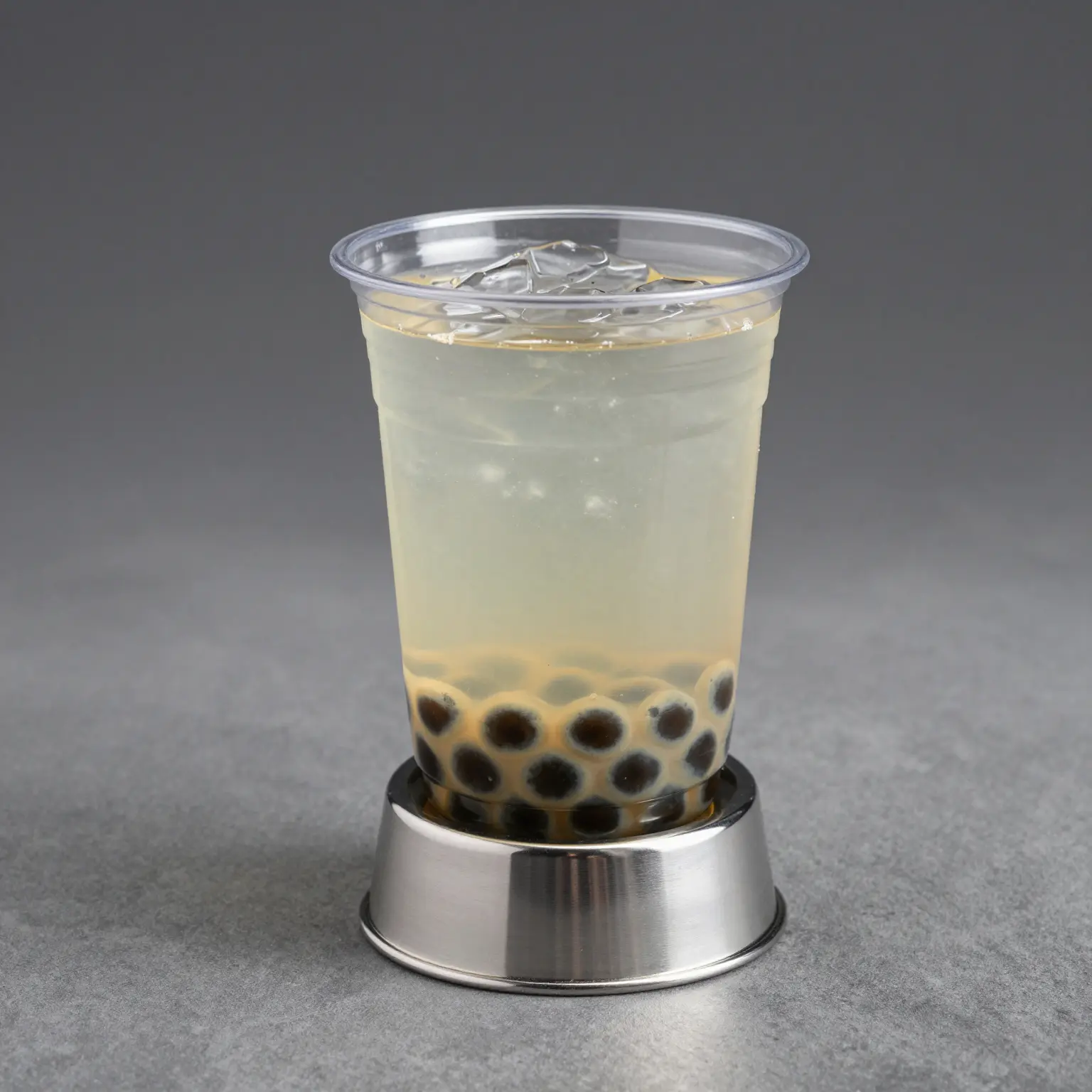Clear Plastic Cup with Metal Base